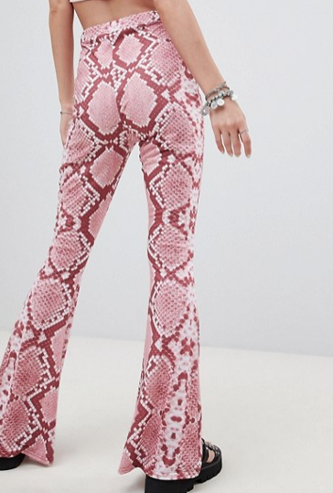 taylor swift reputation tour outfit ideas Rokoko festival flared pants in pink snake print asos